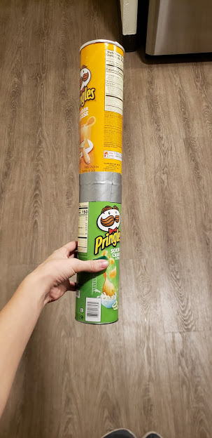 3 taped pringles cans.png