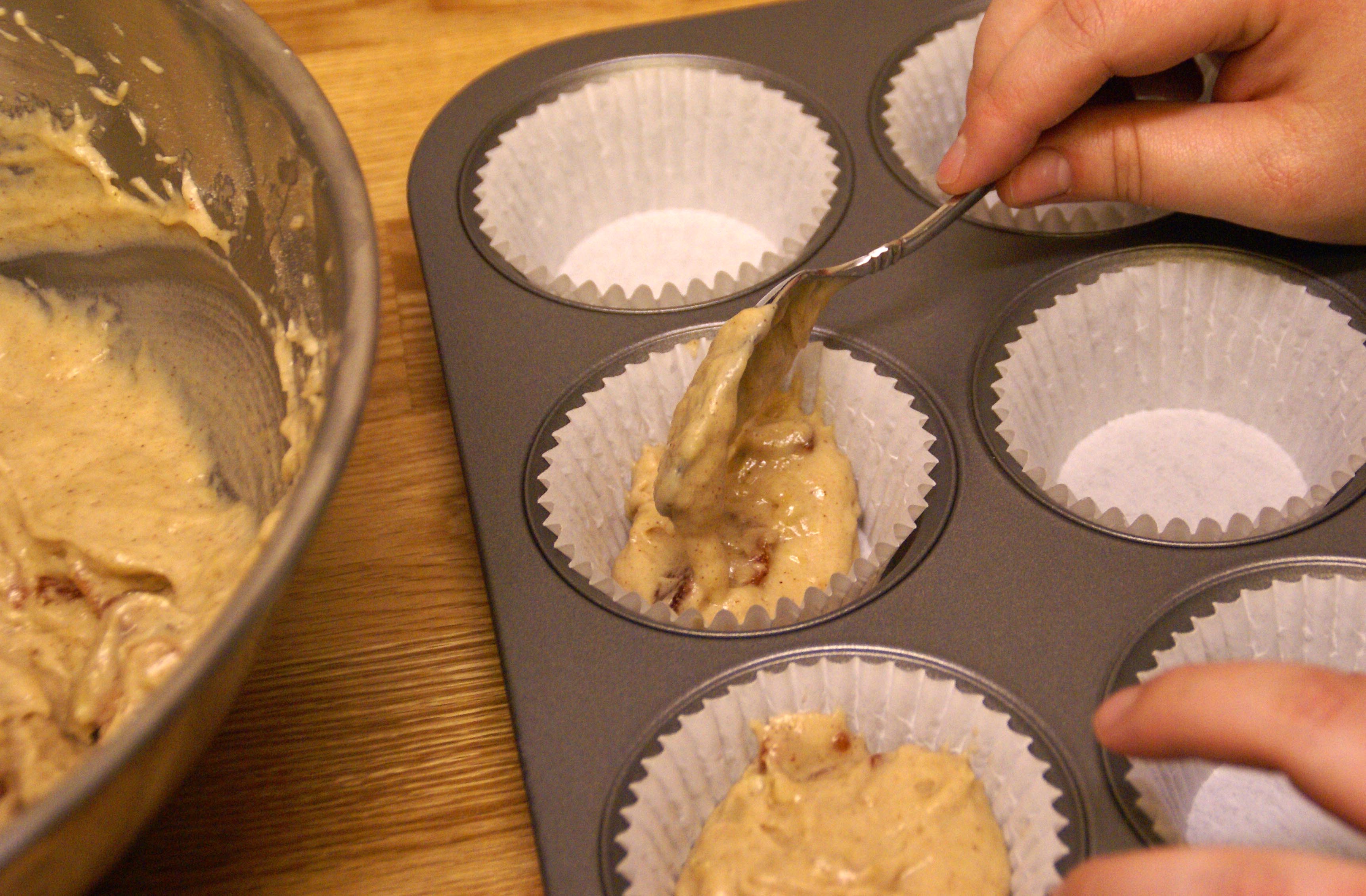 Filling the muffin tins.jpg