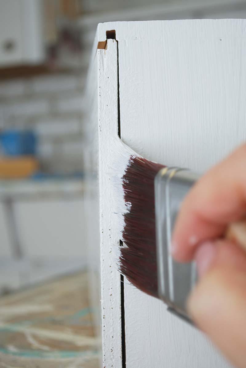 Painting-Uneven-Wood-w-Paint-Brush.jpg