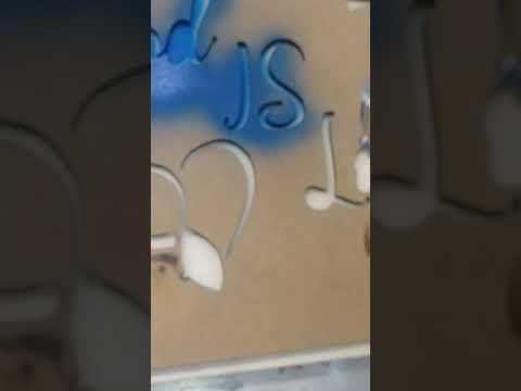 Spray painting a stencil