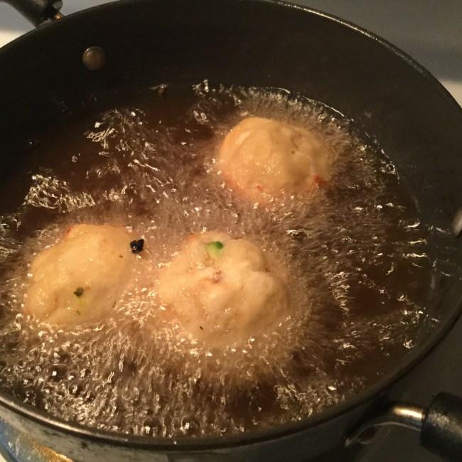 deep frying bread bondas.jpg