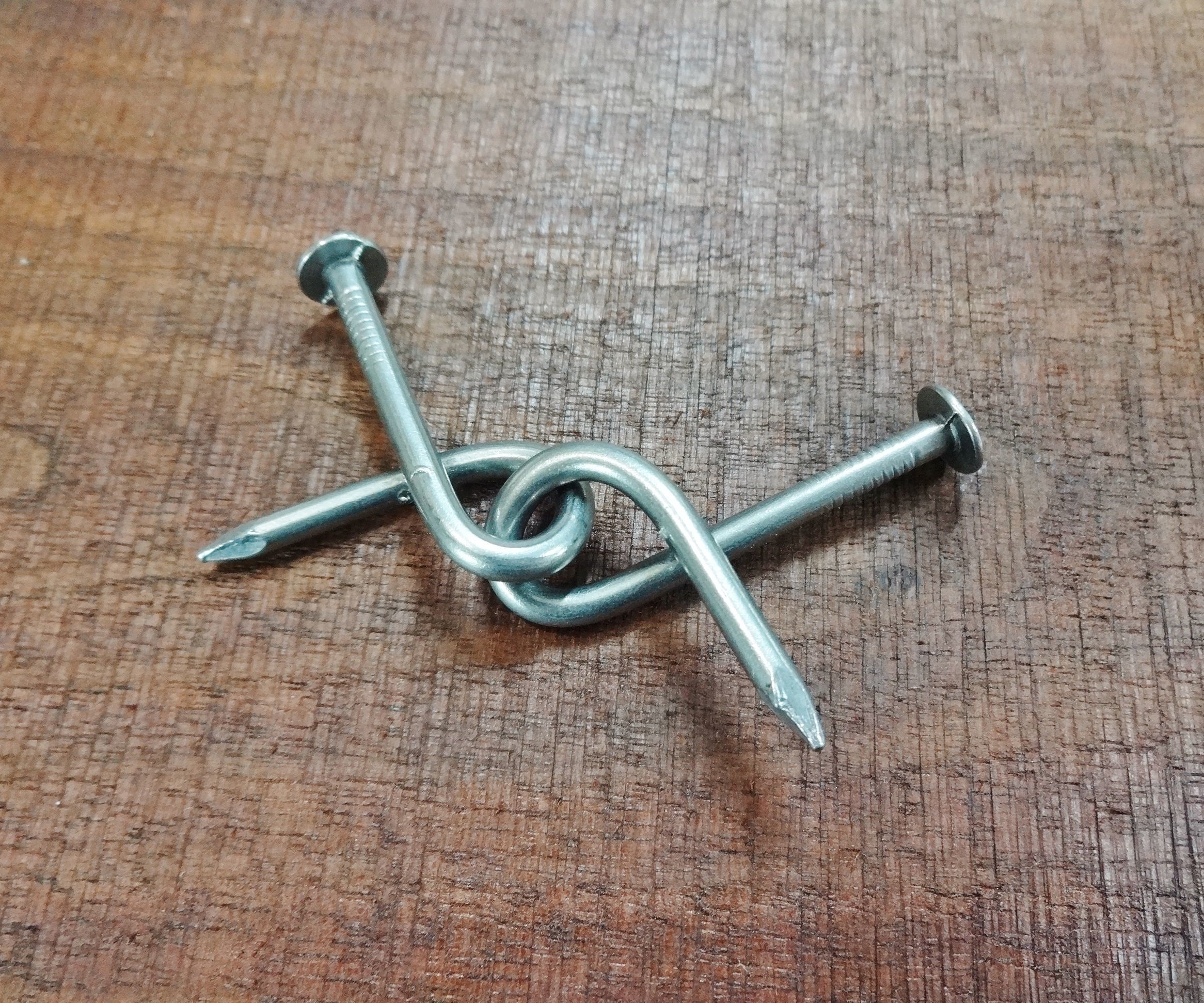 Bent Nail Puzzle